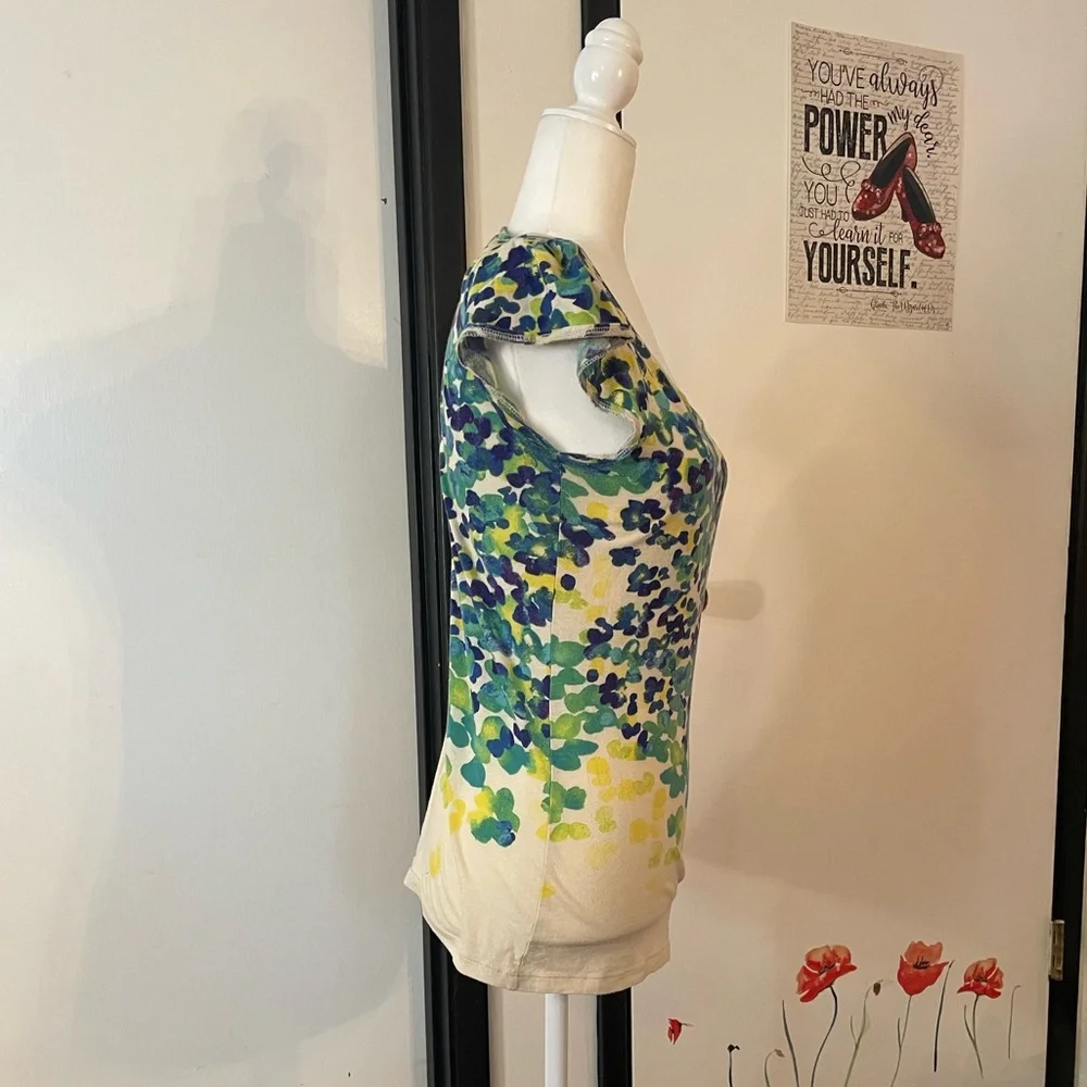 Cream shirt with blues and greens that resemble leaves on a cap sleeve shirt - Picture 4 of 8